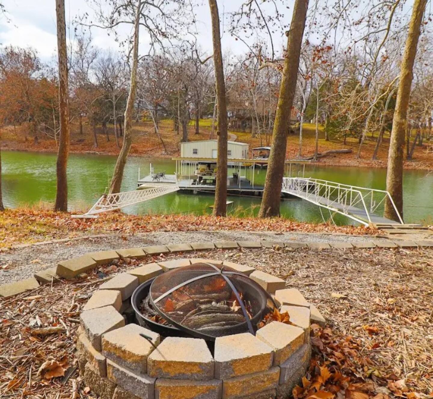View of firepit and lake