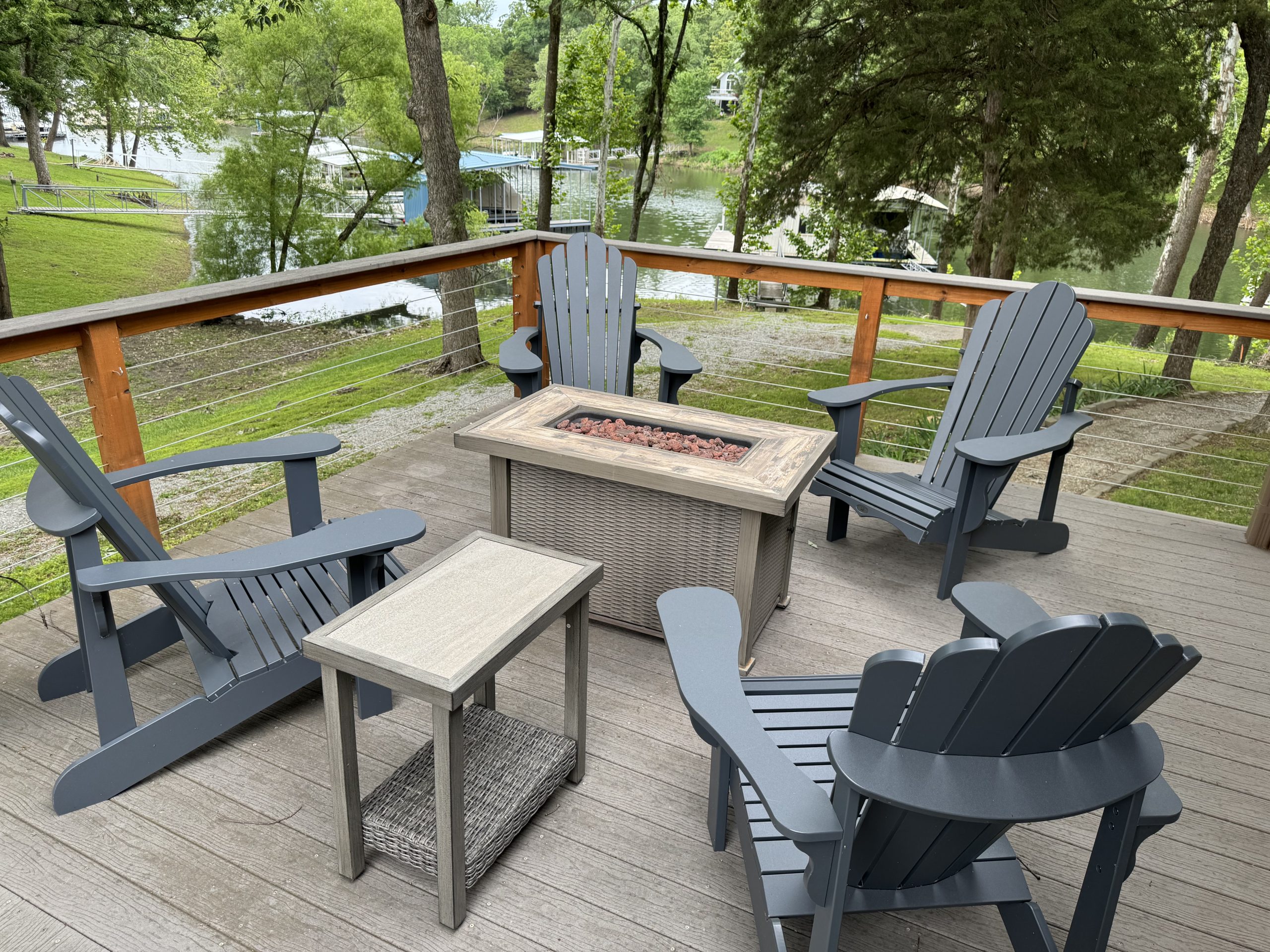 Firepit & Adirondak chairs with a lake view!