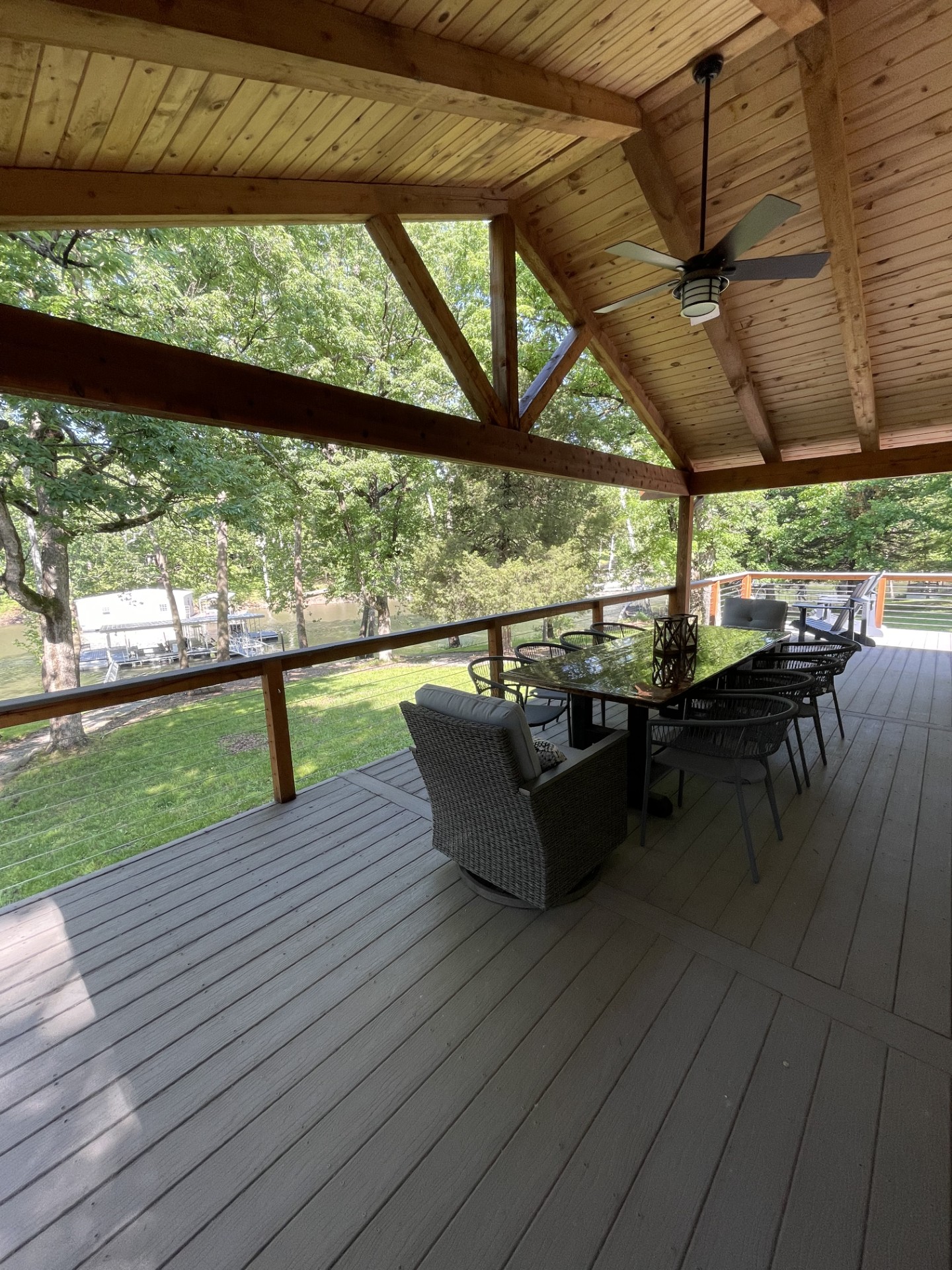 Covered outdoor deck w/ great view of lake